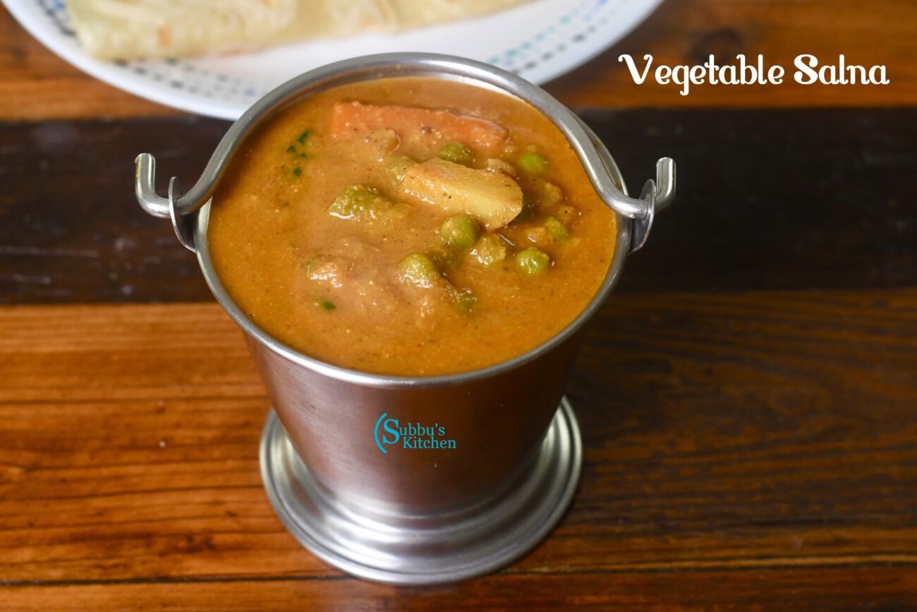 A bowl of colorful vegetable salna, a South Indian curry made with vegetables, coconut milk, and spices.