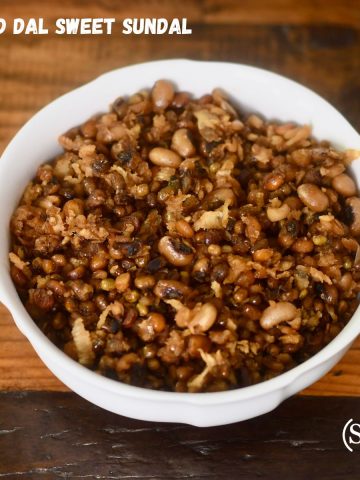 A bowl of Mixed Dal Sweet Sundal made with jaggery, ghee, and a blend of lentils, garnished for Navratri prasadam.