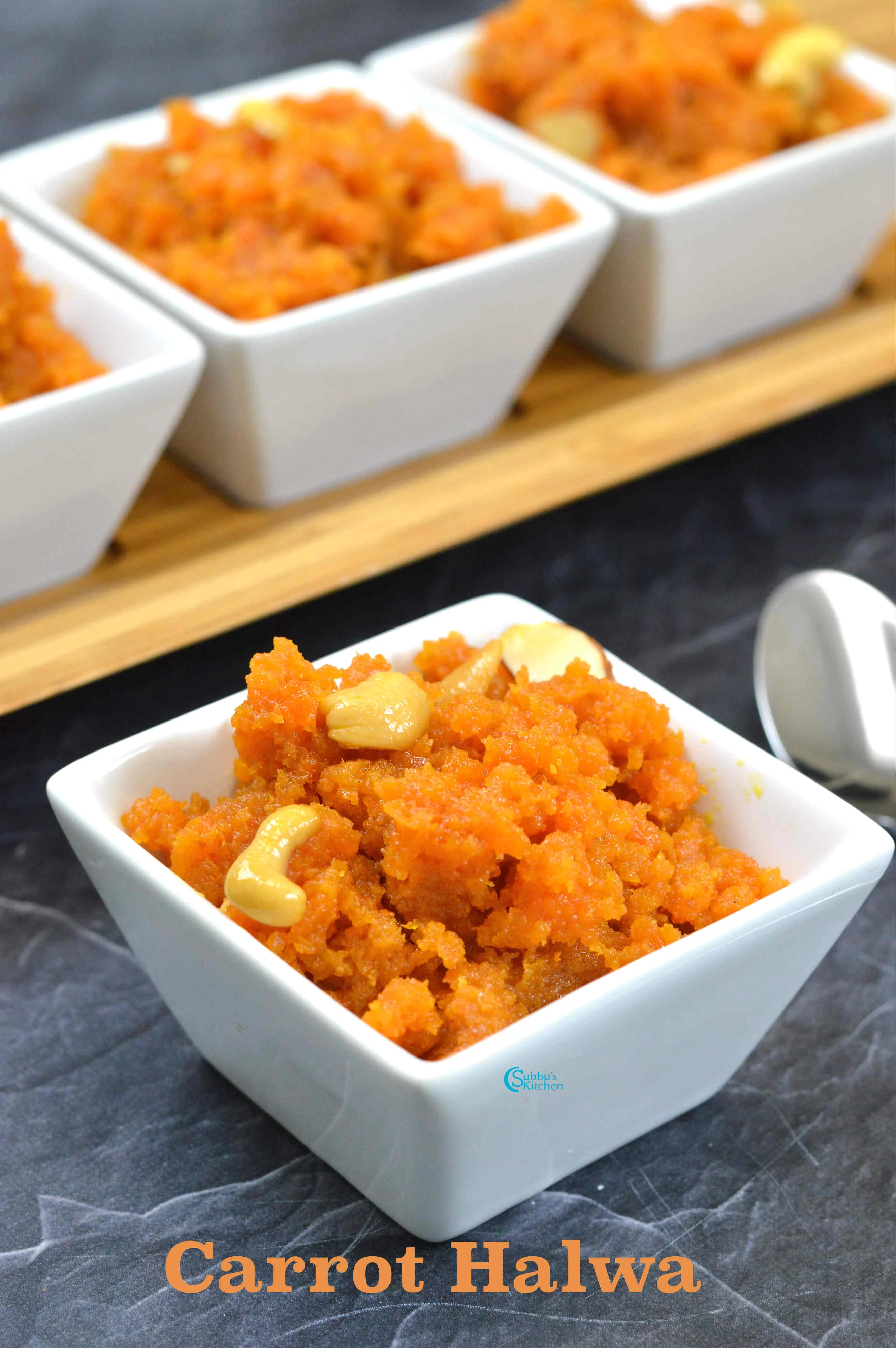 Close-up of Carrot Halwa served in a bowl, garnished with chopped nuts, showcasing its rich orange color and creamy texture.