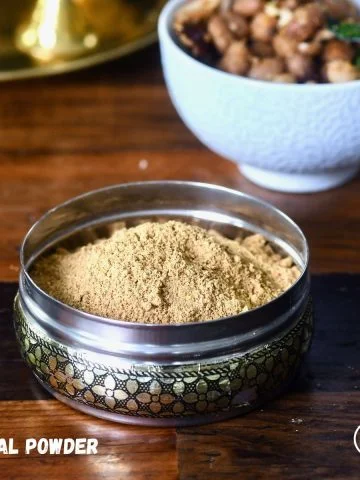 Homemade Sundal Powder in a bowl, made with roasted coriander seeds, channa dal, and red chilies, ready to use for South Indian sundal recipes